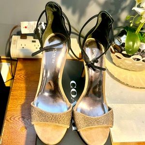 Gently used Coach heels with glitter front portion